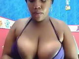 Thick black babe with massive tits teasing