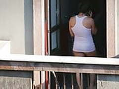 Neighbor in underwear on the balcony