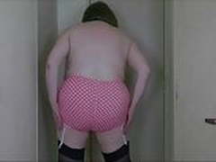Sally in her pink and white spotted pantygirdle