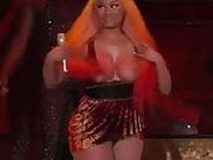 Nicki minaj shows her chest during her show Hot Clip | xvideosearch.com