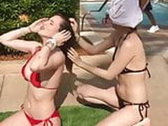 Bella Thorne and Dani Thorne outside in bikinis
