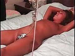 Tied slave gets forced labia pulling clamp pussy torture