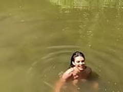 Kendall J. topless in lake, short clip