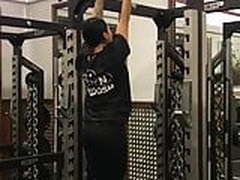 Vanessa White doing pullups at the gym. 