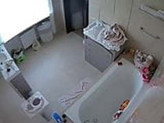 Bathroom voyeur spy of a hot MILF