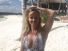 Reese Witherspoon on the beach saying happy birthday