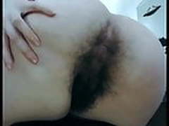 Showing her big hairy bush on cam