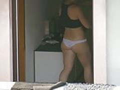 Neighbor in undies while cleaning the room