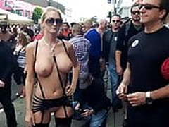 naked busty blonde on fetisch festival