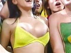 Brazilian soccer fan bounces big tits and nipple pops out