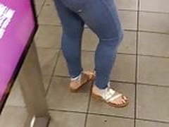 Thick Blonde White Woman in Jeans and Sandals