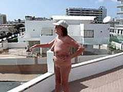 Posing naked on the roof of the hotel 2