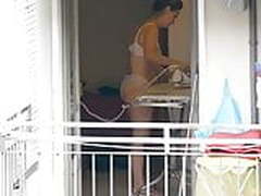 peeping MILF ironing in lingerie